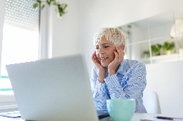 portrait-of-casual-woman-using-her-laptop-while-sitting-home-office-and-....jpg